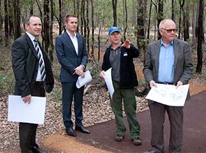 Parks and Wildlife Wellington District coordinator Leon Price, second from right, shows Director of Parks and Visitor Services Colin Ingram, left, Environment Minister Albert Jacob and the departments Director General Jim Sharp key highlights of the Logue Brook Campground development.