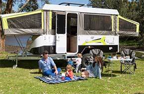Young caravanning family